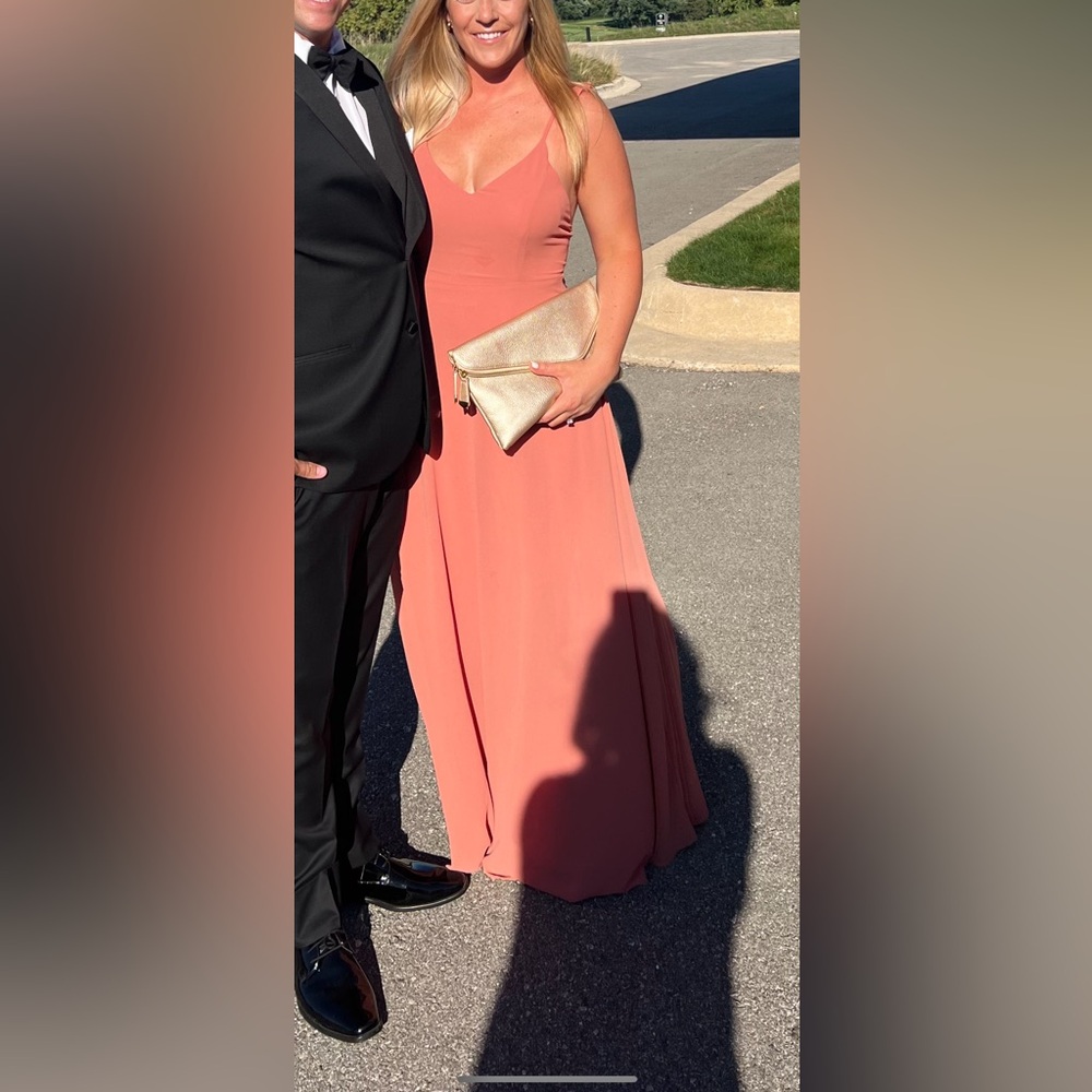 Salmon colored flattering chiffon Lulu dress. Perfect for a Summer wedding!